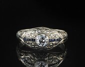 Rare genuine Edwardian .65 Ct solitaire diamond and sapphire sides distinctive ring