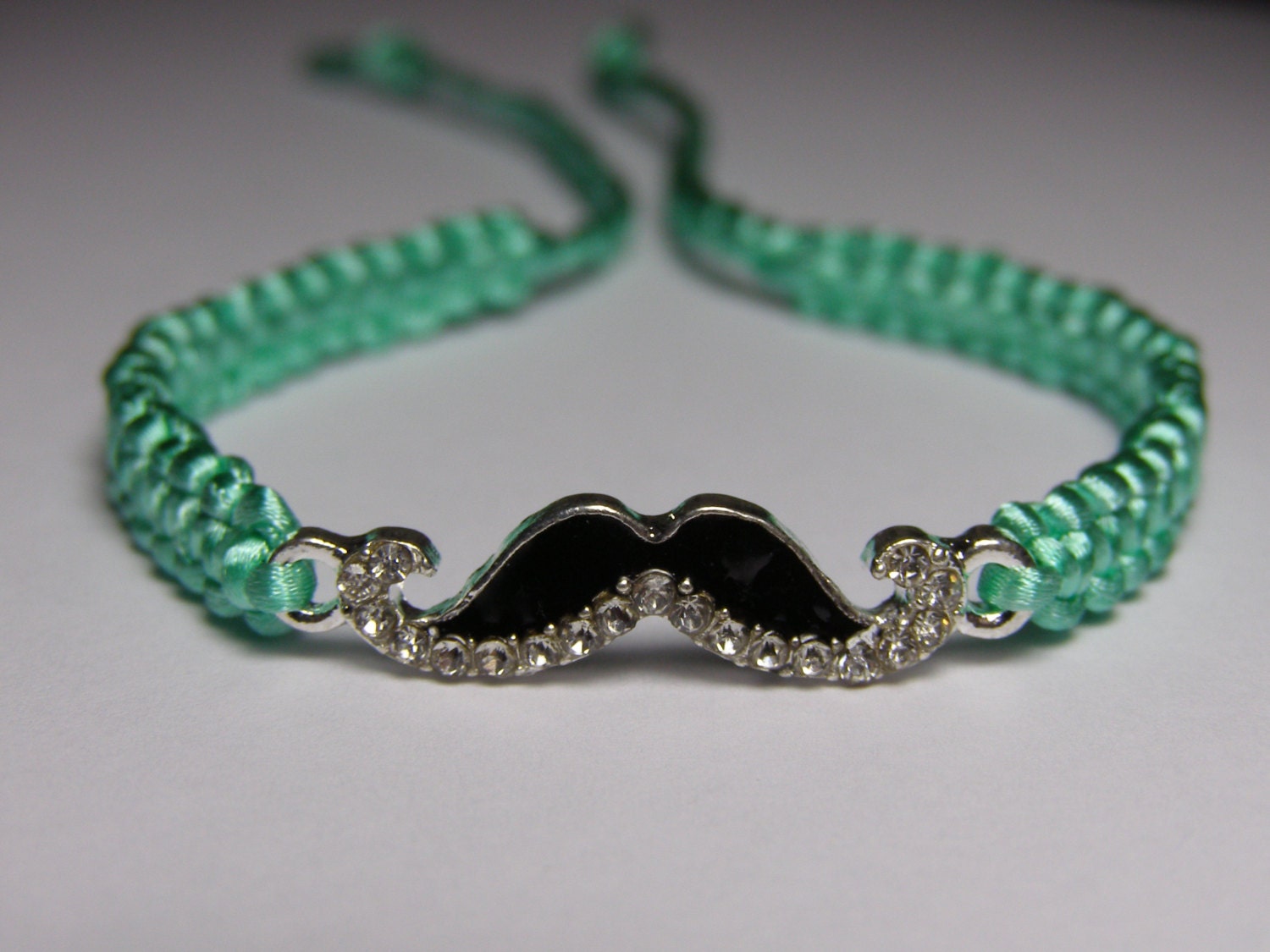 Mustache Bracelet with rhinestones and mint green cord
