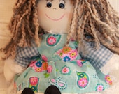 Curls is a unique rag  doll, handmade and crafted with soft and cute fabrics.