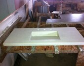 Integral ramp sink bathroom vanity