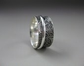 Swirly Patterned Silver Spinner Ring - formandfunktion