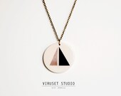 Geometric medallion necklace Scandinavian inspired. Ceramic handmade jewelry with geometric decoration. Viruset Studio