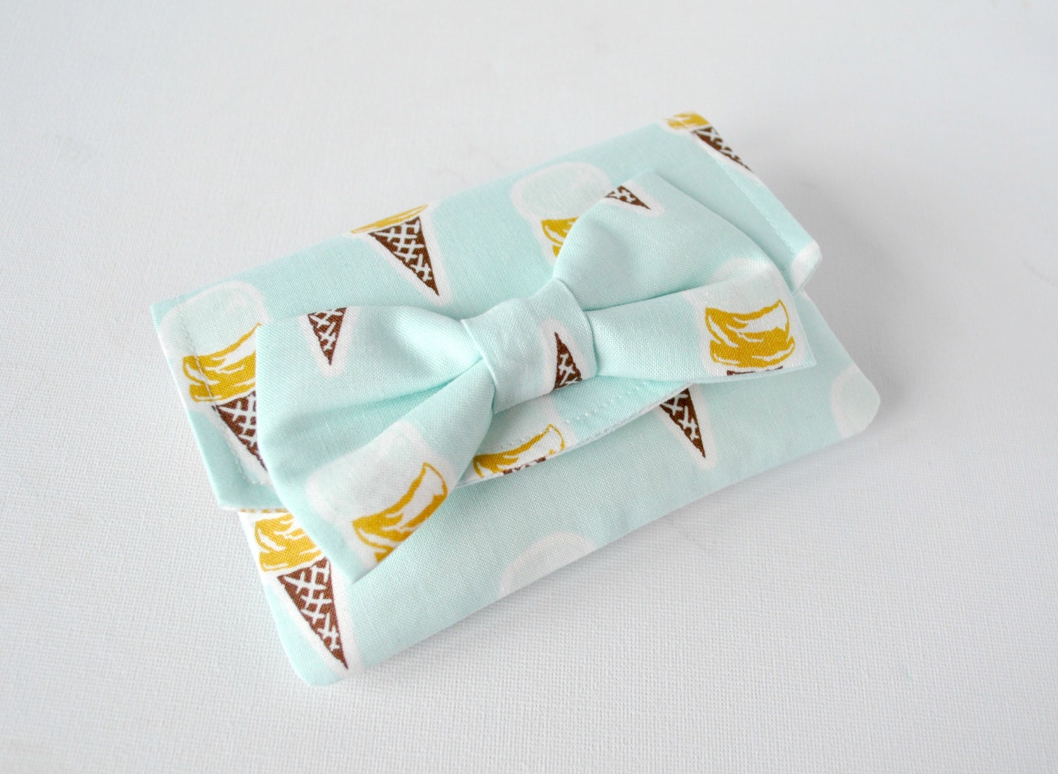 pouch purse wallet: Summertime ice cream cone print in baby blue and yellow with bow.