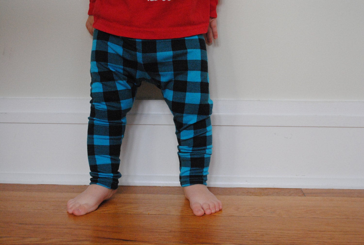 Unisex baby leggings, black and teal plaid