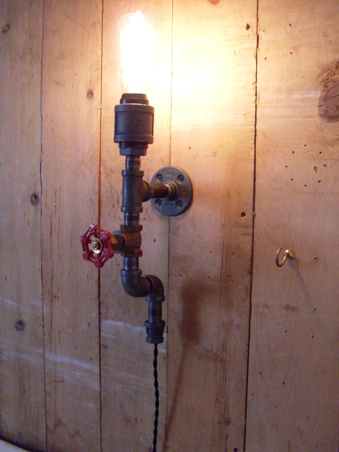 Wall sconce, industrial, steampunk, metal pipe, electric, 60 watt Edison light bulb