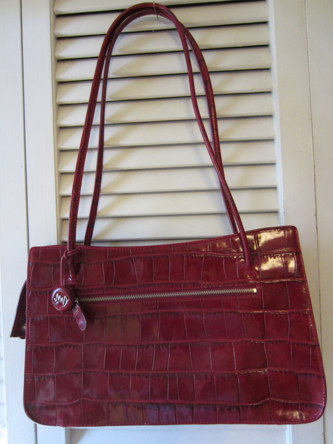 monsac red leather purse