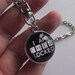 Double-sided, spinning I am Sherlocked / Sherlock Holmes Pendant.