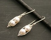 Peapod earrings. Two snow peas in a pod with white fresh water pearls.
