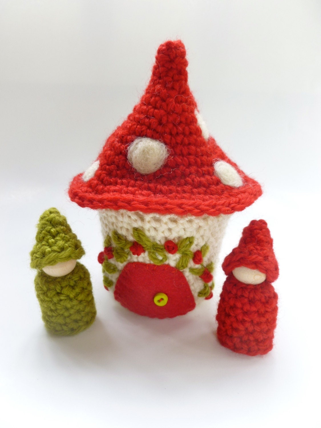 Wee mushroom cottage with peg dolls