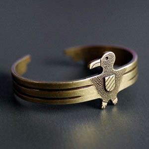 NEW . the messenger . antiqued brass