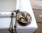 Fleur de lis Locket Necklace
