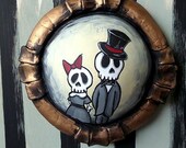 convex skeleton couple portrait sculpture