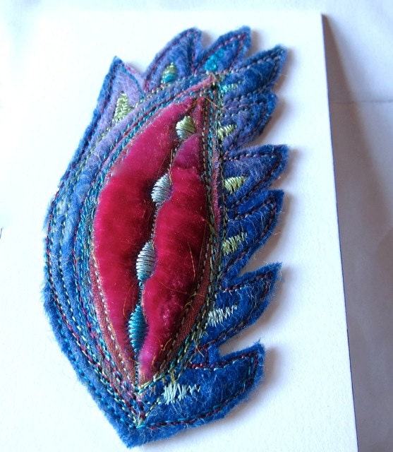 Delicate spring colours felt brooch.