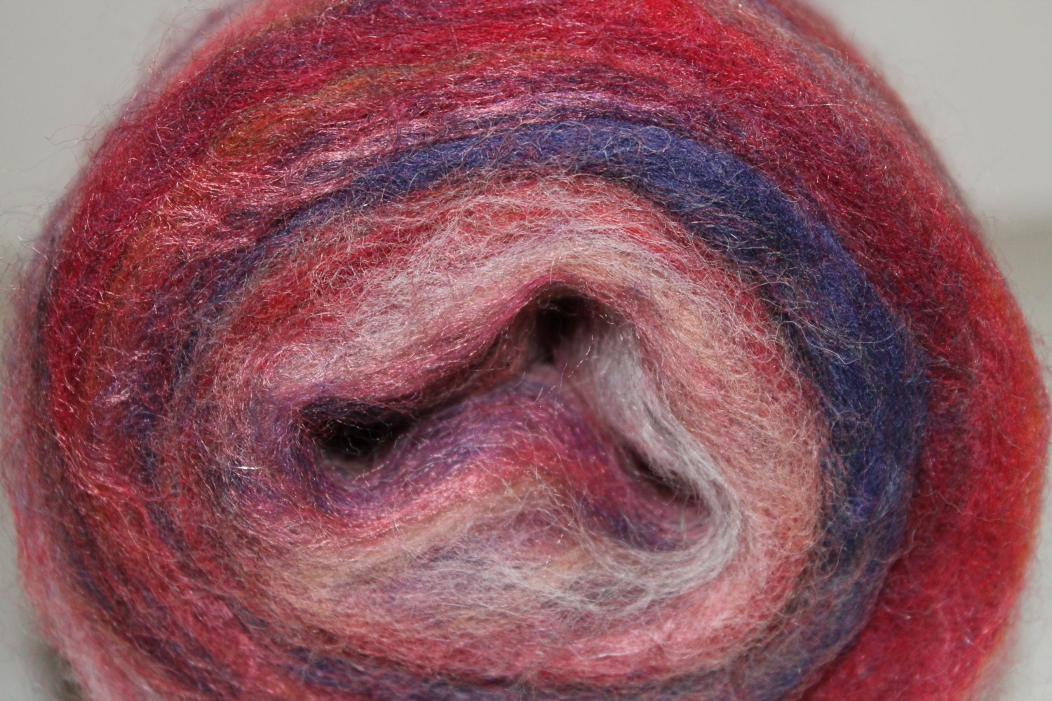 Merino wool blended center pull roving.  Motley Crue 1.  3oz