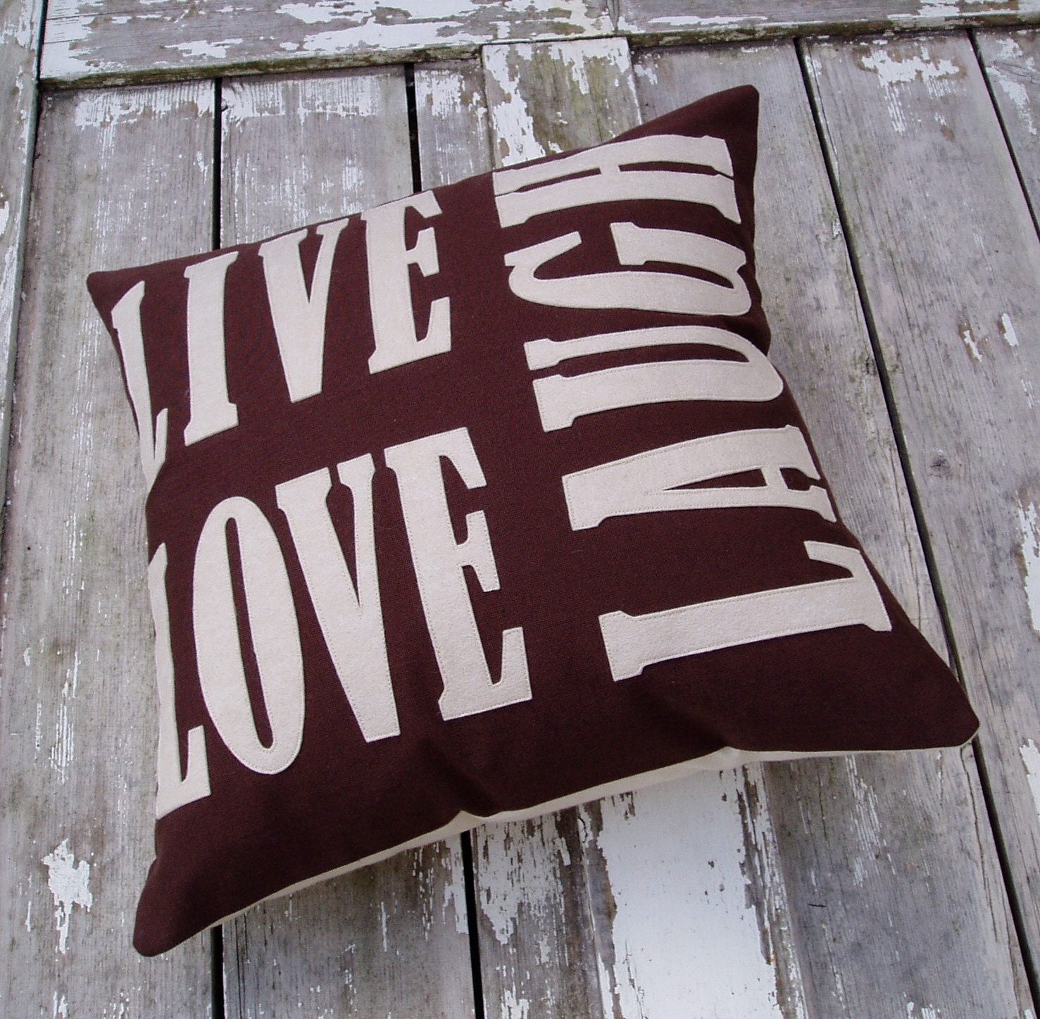 ONE OFF ITEM. Love Laugh Live Cushion/pillow in chocolate brown linen & wool felt fabric.