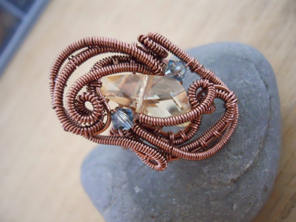 Golden Shadow Swarovksi Wing and Blue Ring Wire Wrapped in Antique Copper Parawire Size 7