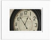 Vintage wall clock -  printed on page from old dictionary