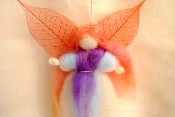 Wool blessing fairy art doll Waldorf education in light blue and purple