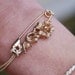 Always and Forever. vintage,floral,pearl,safety pin ,friendship, string bracelet. Tiedupmemories