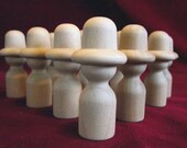 12 of the No. 15 Cowboy with Hat Commercial Hardwood Peg Doll