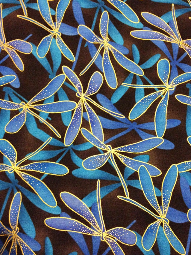 Kona Bay Magical Flight blue and gold dragonfly cotton fabric yardage