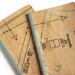 large moleskine cahiers notebook or journal with lined pages and sewing pattern collage, stitch and sew (imperfect)