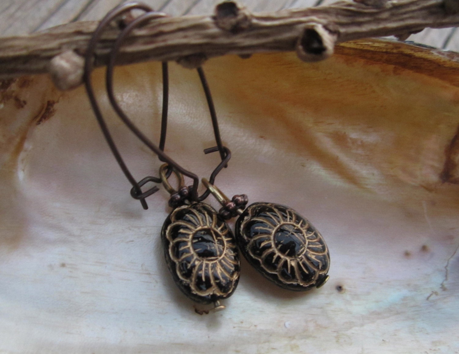 Gorgeous carved black and gold earrings,antique looking, on long ear wires