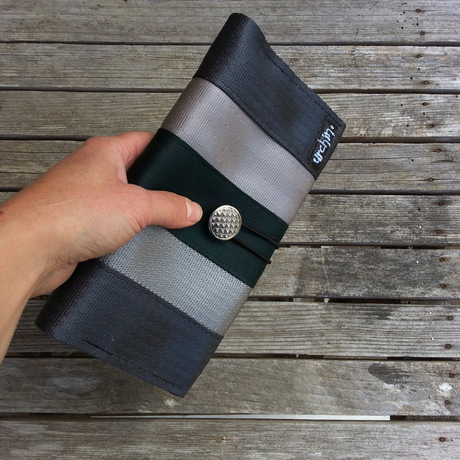 Eco friendly ladies wallet made from reclaimed seat belts and bicycle inner tube