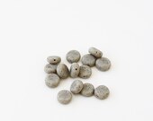 bag of beads in speckled grey