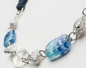 Chunky blue and white and silver spacer necklace and blue jersey tie