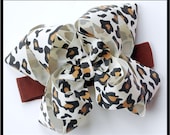 boutique double layered BIG LEOPARD CHEETAH hair bow on a headband