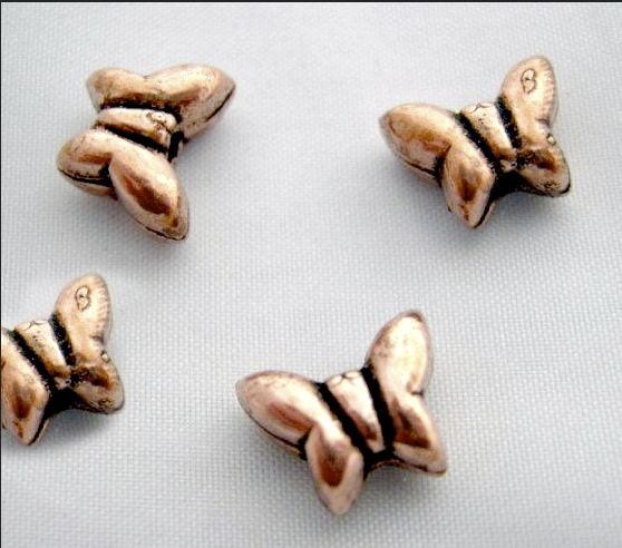 Copper butterfly beads Pack of 4