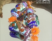 SALE -- 9 handmade lampwork beads -- SRA -- glass set -- Calypsos Beads -- made by Silke Buechler -- N o m i