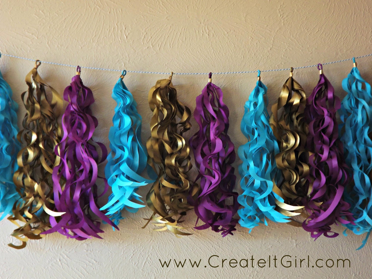 Curly Tissue Tassel Garland with 15 tassels. Weddings, Parties, showers and birthday parties. Plum, carribean teal and Metallic gold