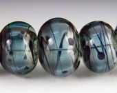 Hollow Lampwork bead set, variated colors with drizzle