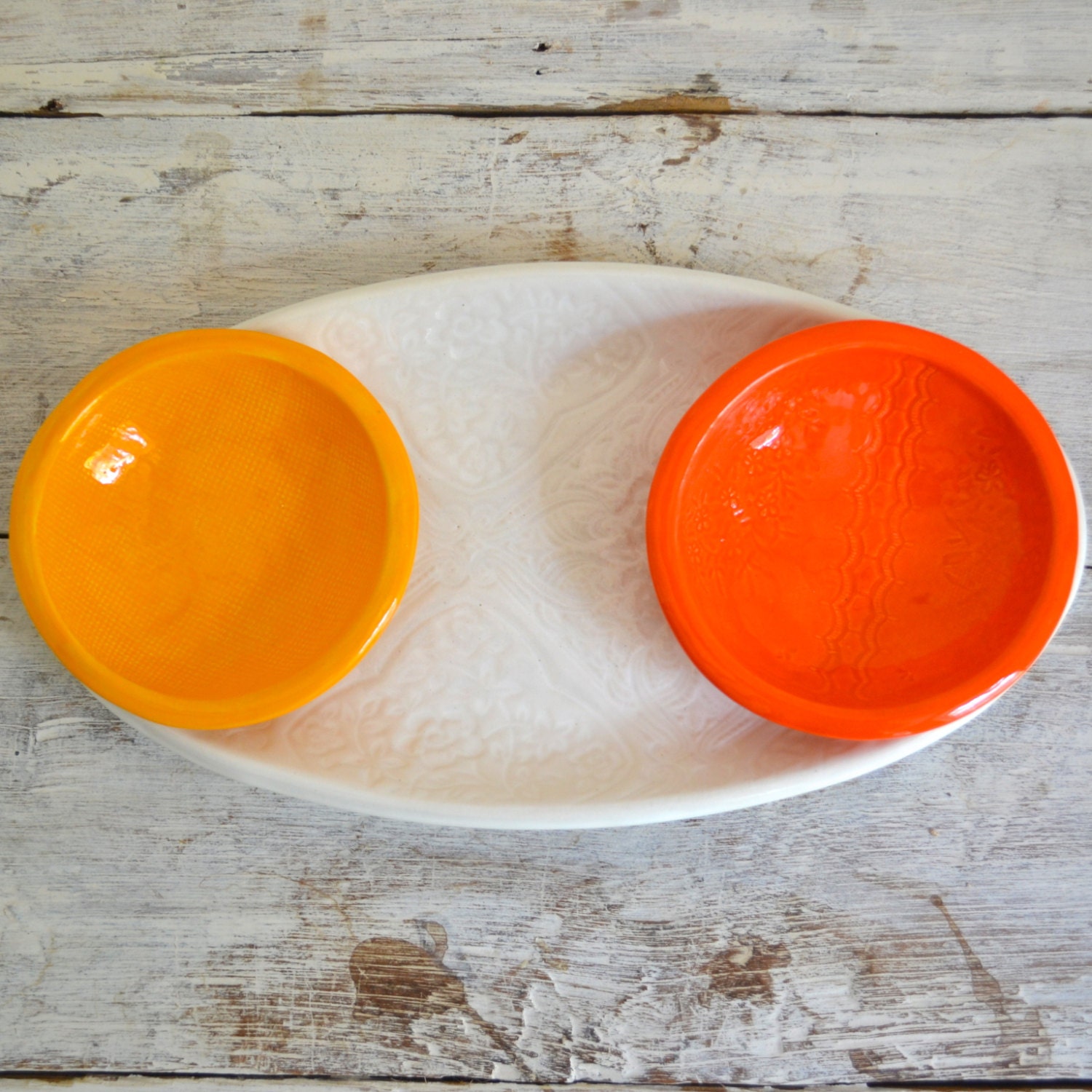 2 small bowls in Orange and Tangerine and a White medium oval platter  - mixed Wobblies - Wobbly Plates Series