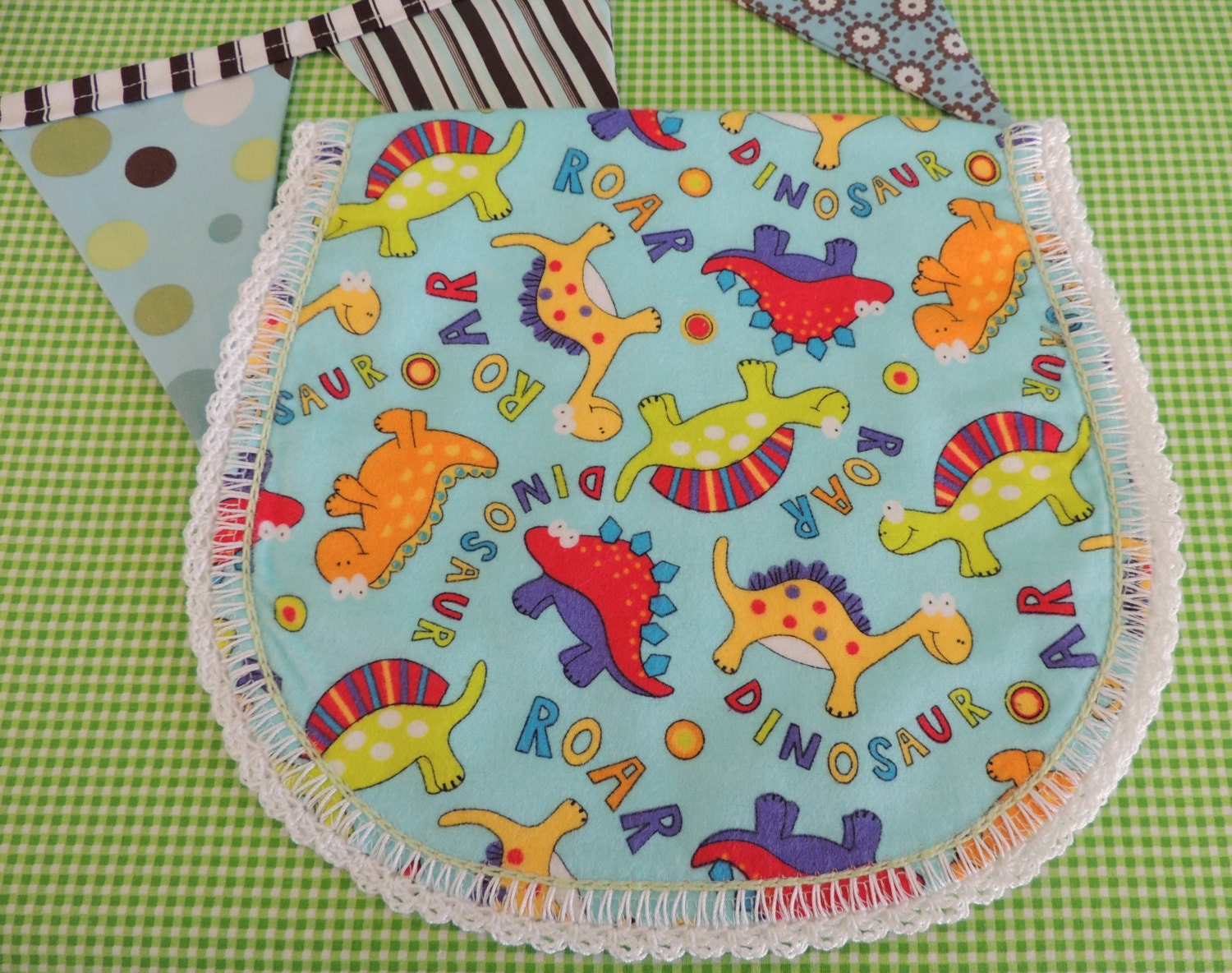 Baby Burp Cloth in a darling Dinosaur print is perfect for he little man in your life and sure to make you the hit of the baby shower