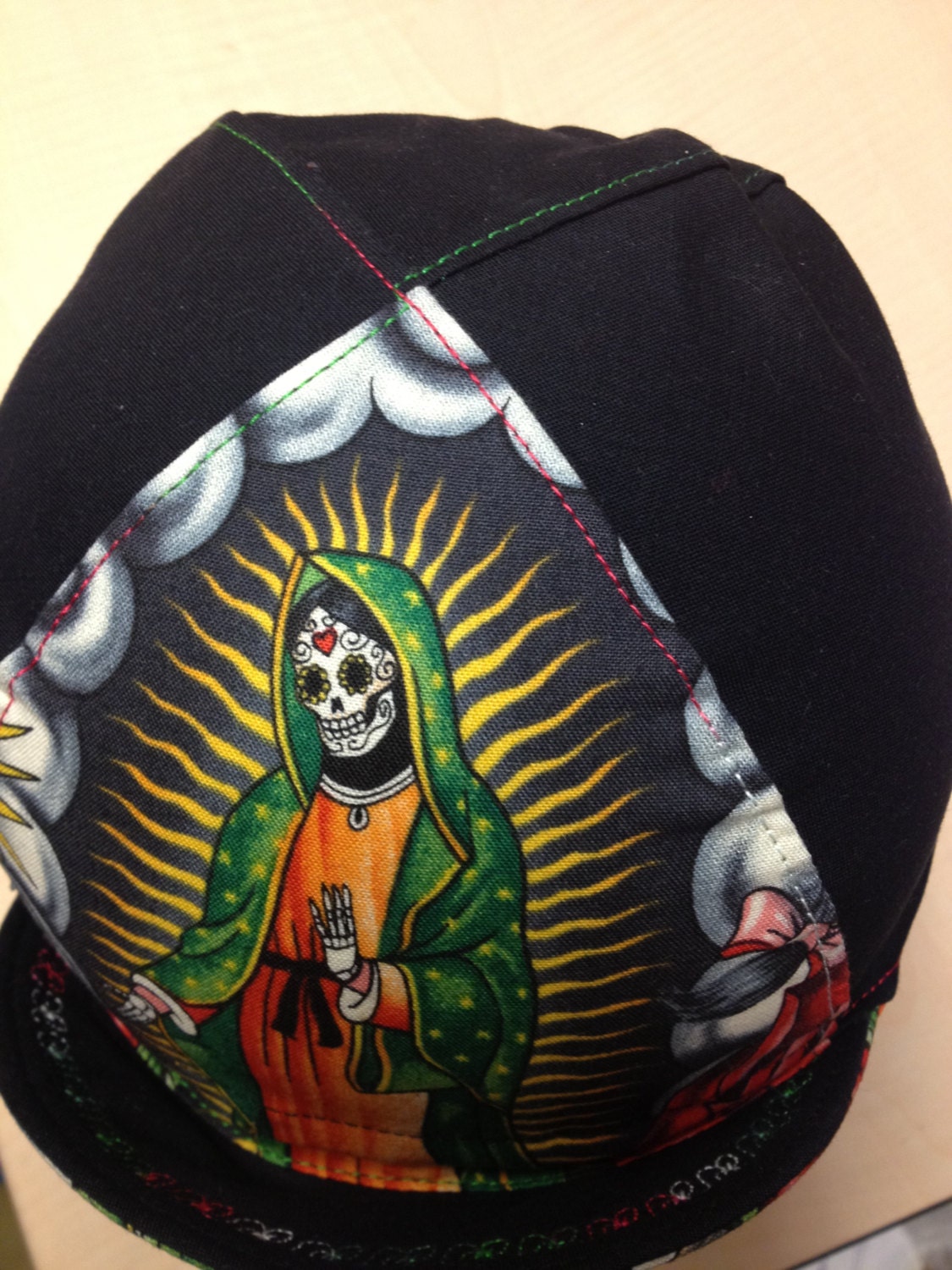 Handmade Our Lady of Dia de los Muertos  Cycling Cap inspired by Jose Gaudalupe Posada with black fabric