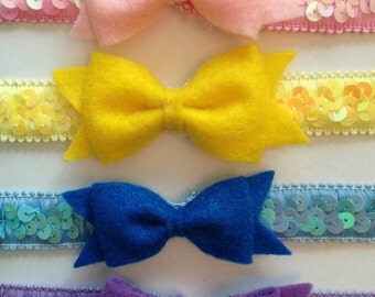 Set of 4 sequin headbands with felt bows, yellow, pink, blue, purple