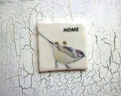 A Handmade Porcelain Bird Design Button
