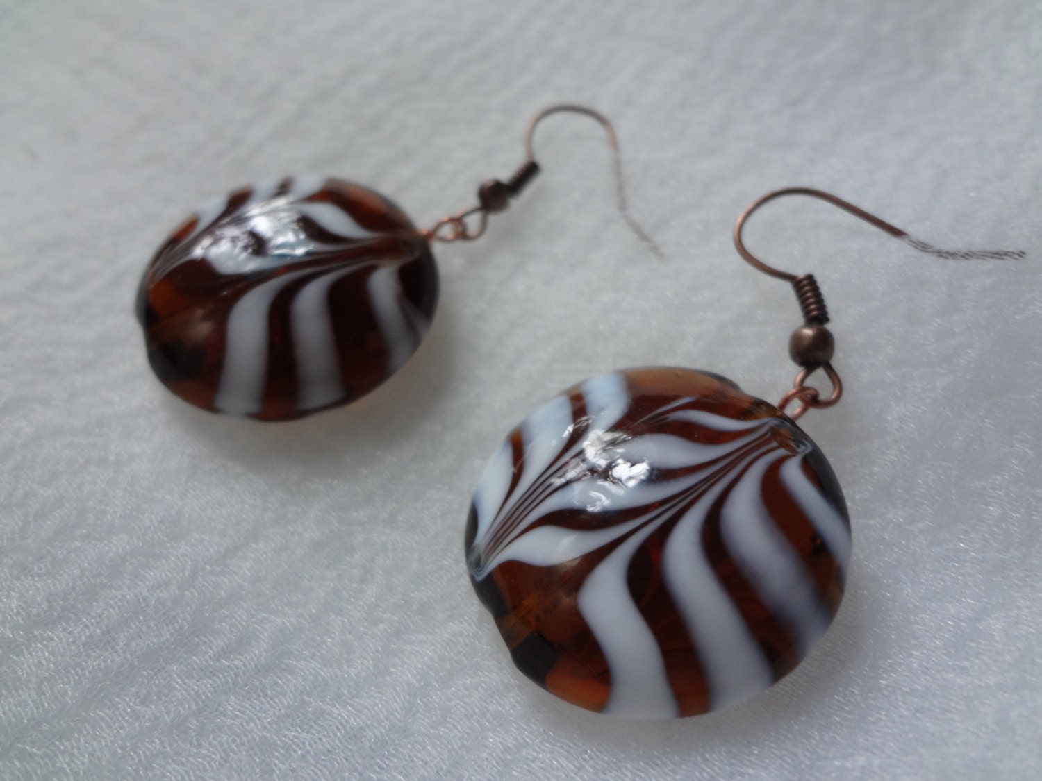 Swirly brown and white glass earrings