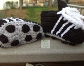 Crocheted soccer cleats for babies in four sizes