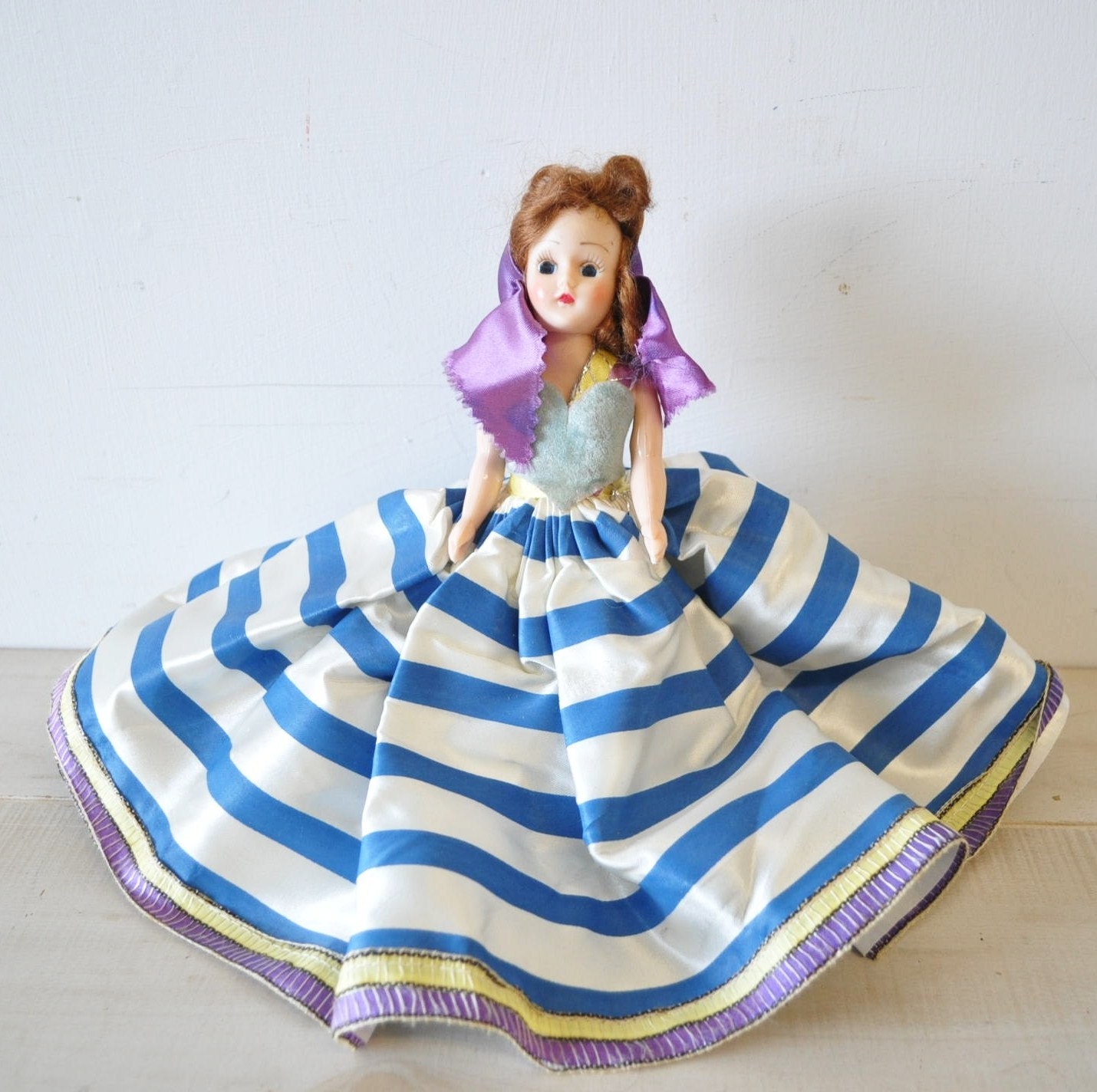 antique doll with clothes