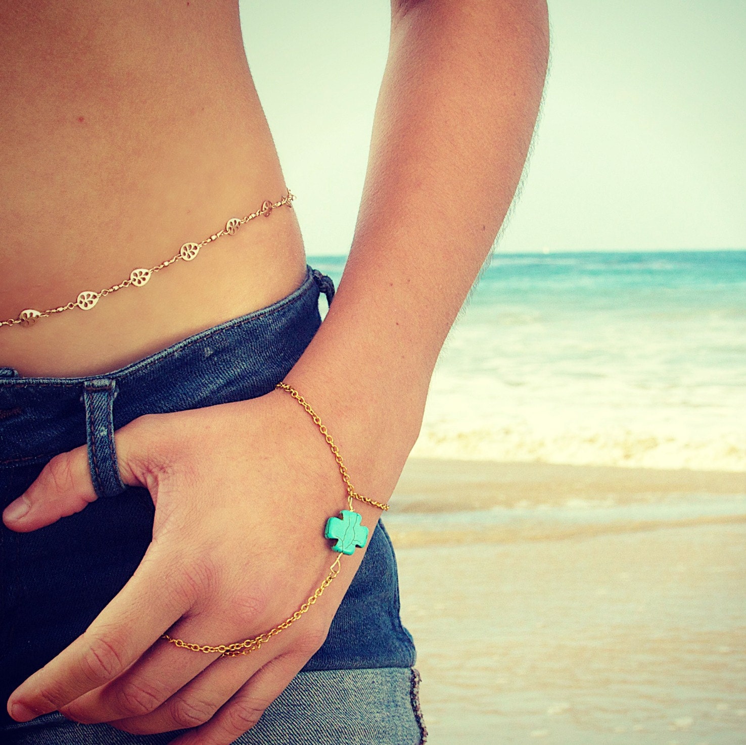 turquoise cross hand jewelry. slave bracelet. hand chain