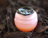 Figure 1: NOIR  Natural Solid Perfume - Rain, moistened vital earth - Creamy, vegan musk fragrance sample.