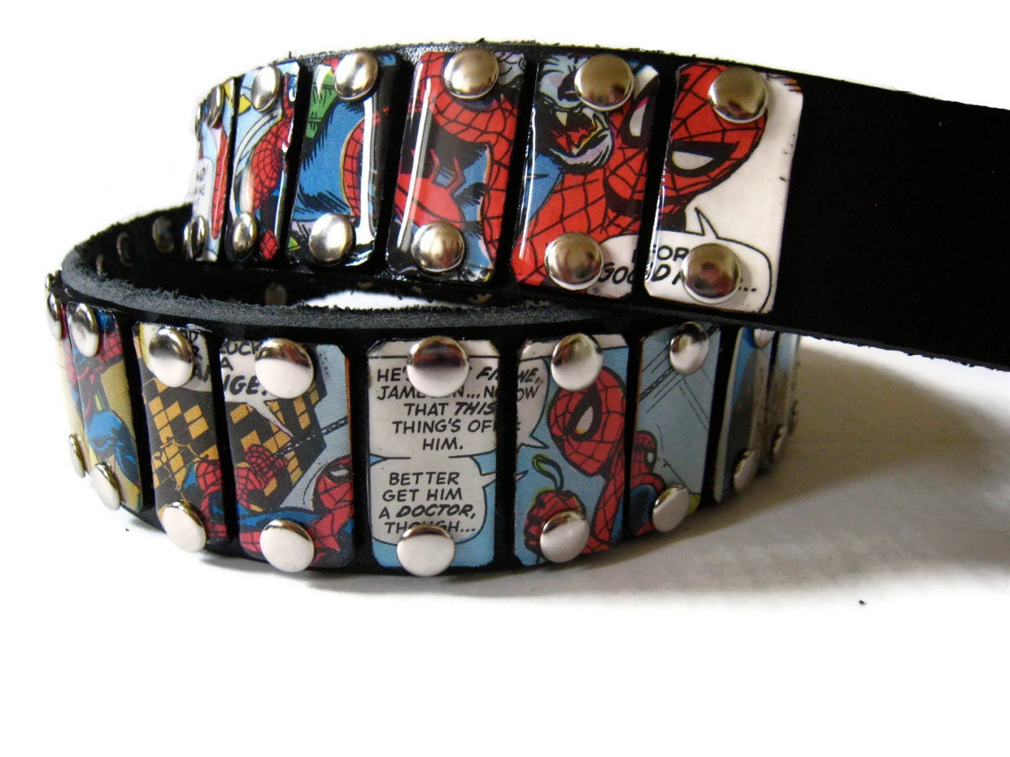 Studded leather belt featuring an art mosaic made from actual salvaged Superhero 1970s storybook record album inserts