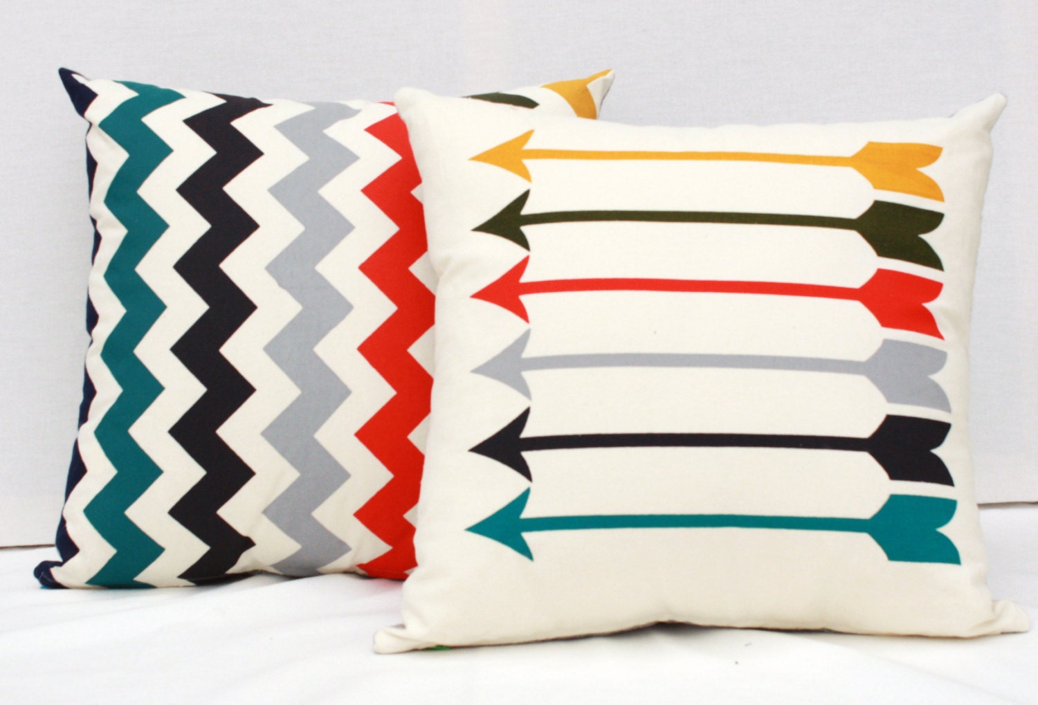 Sharp Shooter - 19 x 19 arrow pattern, muted rainbow organic screenprinted pillow