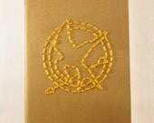 Mockingjay (The Hunger Games) Hand Embroidered Moleskine Notebook