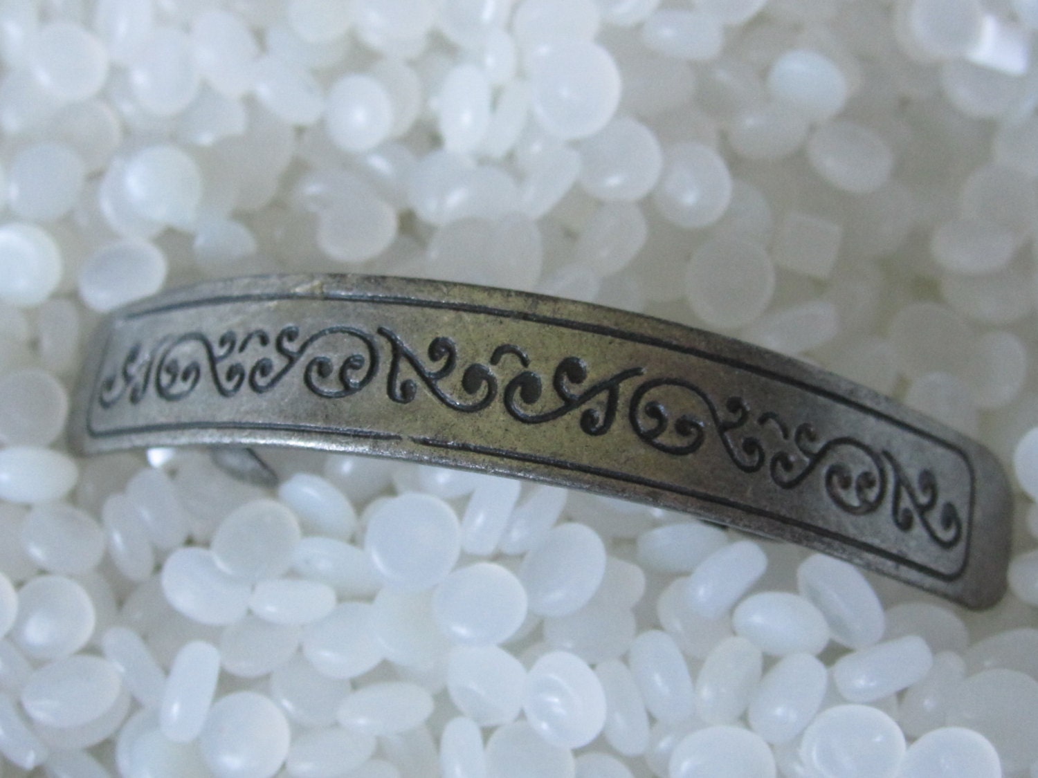 silver tone pony tail holder