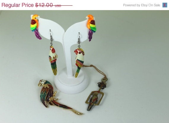 ON SALE Cool lot of 4 vinatge parrot items 2 pairs of earings 1 brooch and a tin charm 40s-80s